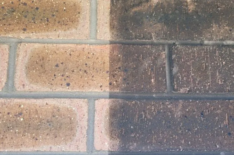 Masonry surface showing cleaned and uncleaned areas side by side